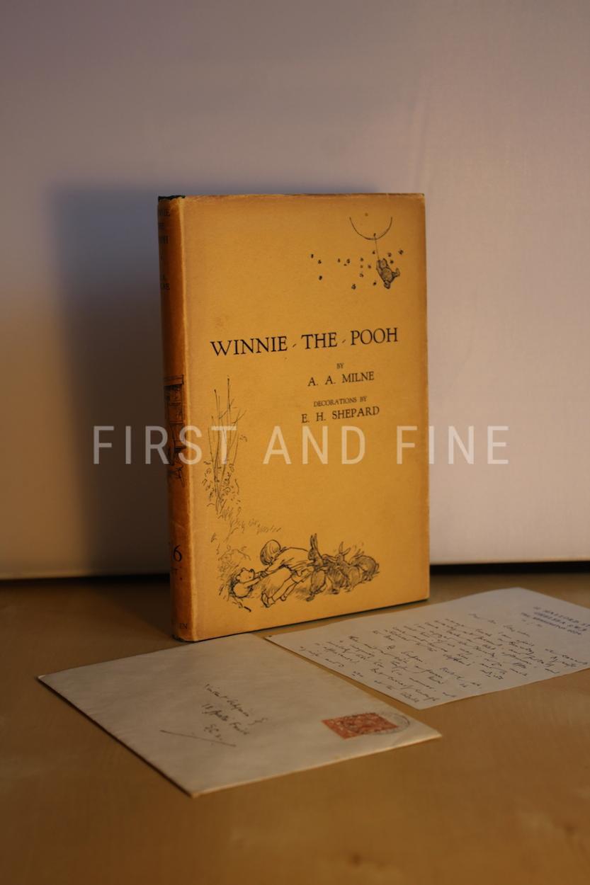 Milne, A.A. (1926) 'Winnie-the-Pooh', UK first edition in first state dust jacket and signed original letter